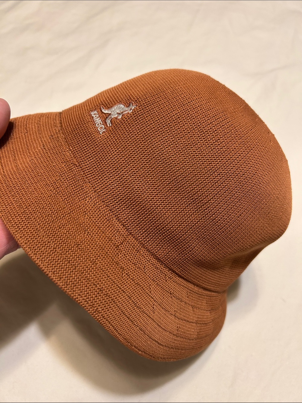 Kangol Rust Knit Bucket Hat with White Logo